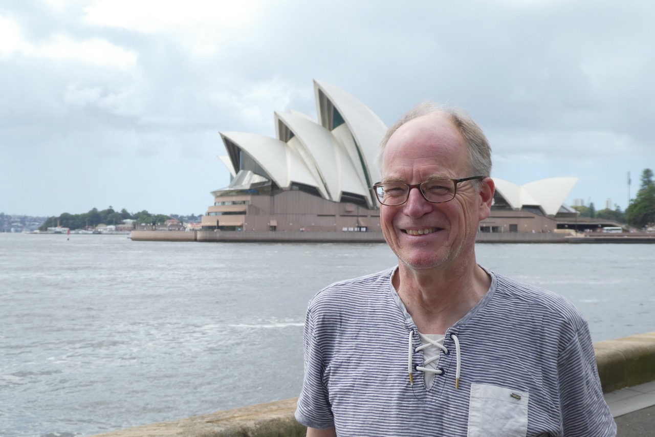 portrait of Dr. Thomas Einfalt in front of the opera Sydney